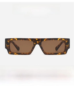 Close-up of retro flat top rectangle sunglasses with tortoiseshell frame and brown lenses