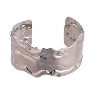Minimalist silver wide cuff bracelet with irregular crumpled texture and lava pattern finish