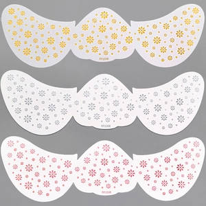 Detailed view of floral K92008 freckle tattoo stickers in gold, silver, and pink metallic