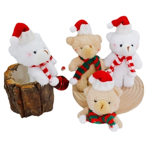 Christmas plush bears in white and brown with festive knitted hats and scarves decor