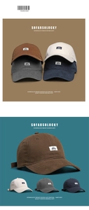 Close-up of four minimalist cotton baseball caps featuring embroidered mountain patch logo