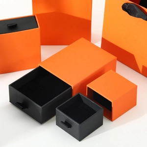 Premium orange drawer jewelry box set with black ribbon handle and matching gift paper bag