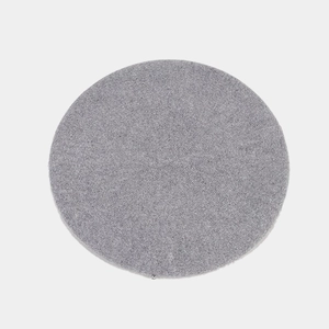 Top view of grey knitted beret showing radial circular knitting pattern and metal buckle