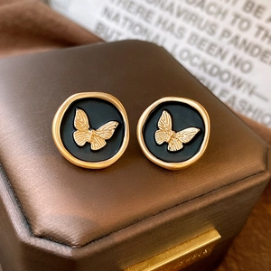 French vintage black stud earrings with golden 3D butterfly relief in gift box