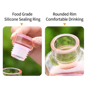 Transparent glass water bottle with time scale, pink silicone seal and smooth mouth
