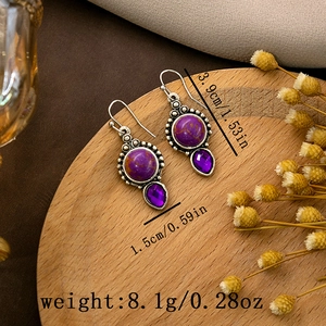 Detail view of purple stone bohemian earrings with dimensions 3.9cm length and 1.5cm width