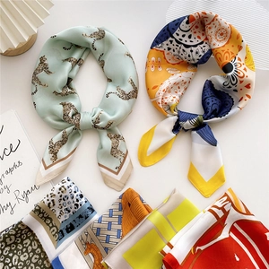 Collection of elegant satin square scarves with floral and leopard patterns for women