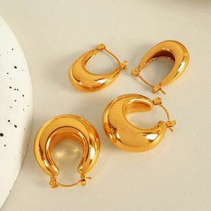 Minimalist thick gold hoop earrings in polished 18K plated stainless steel for women