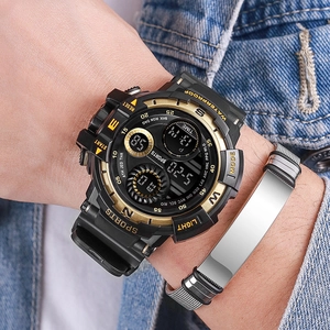 Macro view of digital sports watch dial with gold accents and waterproof features