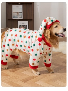 Close-up of thick coral fleece dog onesie with colorful polka dots on a Golden Retriever