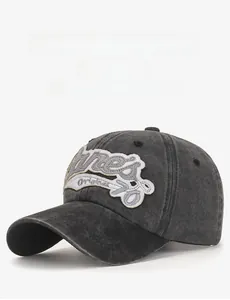Close-up of James Original 78 embroidery on charcoal washed denim baseball cap