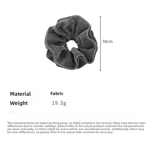 Detailed view of grey shimmering double-layered scrunchie with 18cm diameter size
