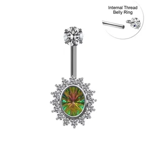 Detail of internally threaded navel ring with silver metal and colorful opal stone