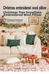 Close-up of Christmas embroidered plush pillows featuring green and white trees