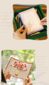Detail of opening a gift box with a 3D pop-up floral greeting card and red roses