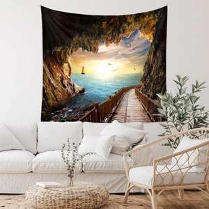 Tapisserie murale paysage de grotte au coucher du soleil sur un canapé de salon moderne