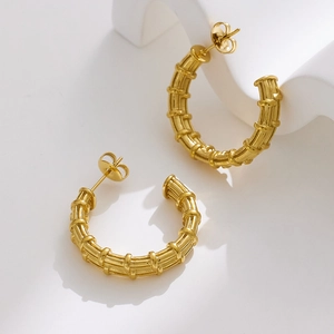 Boucles d'oreilles créoles en acier inoxydable doré 18 carats en forme de bambou