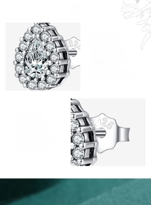 Macro shot of S925 sterling silver water drop stud earring with pear-cut zircon inlay