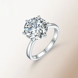 Detailed macro view showing the S925 silver hallmark on a classic six-prong moissanite ring