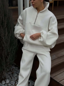 Women's cream white two-piece sweatsuit with half-zip sweatshirt and wide-leg joggers