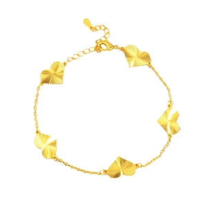 Elegant gold heart charm bracelet with five radiant textured pendants and 925 stamp