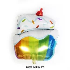 Detail view of large rainbow cake foil balloon for birthday party decorations 56x80cm