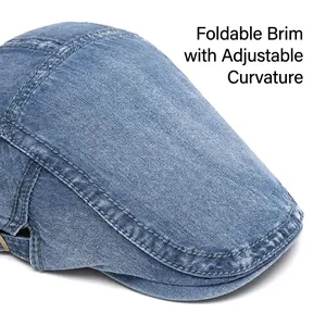 Classic washed denim newsboy cap in blue featuring high-quality stitching and curved brim