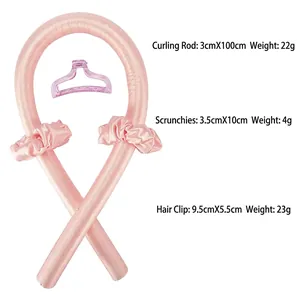 Pink heatless hair curler set with EVA foam roller, two scrunchies and a purple hair clip