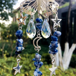 Detail of silver butterfly suncatcher with blue natural stones and crystal pendants