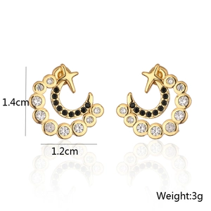 Detail of 18K gold plated C-shaped moon and star earrings with zircon inlay measurements
