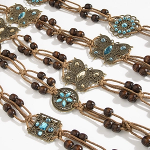 Bohemian braided belt with wooden beads and bronze butterfly rhinestone charms