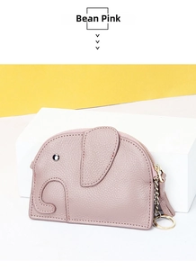 Detail of pink elephant leather coin purse with metallic keychain and pebble texture