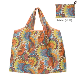 Foldable Oxford fabric shopping bag with colorful ethnic patterns and compact folded view
