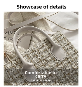 Close-up of white tweed texture and high-quality leather handle on fashion handbag