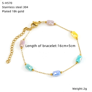 Detailed view of colorful crystal beads on 18K gold-plated stainless steel bracelet