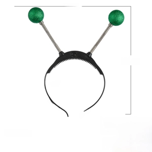 Detail showing green glitter eyeball spring headband with dimensions 11x9.5 inches and weight