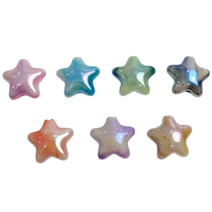 Macro shot of seven iridescent gradient star beads in various colors for DIY jewelry making