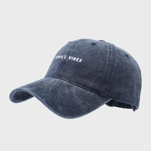 Macro detail of Chill Vibes embroidery on washed grey cotton vintage baseball cap