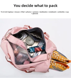 Internal view of pink travel bag showing laptop compartment and large storage space