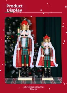 Close-up of wooden nutcracker set with red velvet capes and green plaid outfits