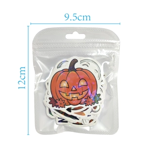 Close-up of Halloween laser stickers with pumpkin motifs in 12x9.5cm packaging bag