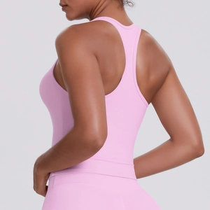 Close-up of pink racerback sports top showing seamless fit and high-stretch fabric details