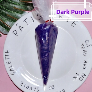 Macro shot of 100g dark purple pearlescent cream glue in a piping bag for DIY crafting
