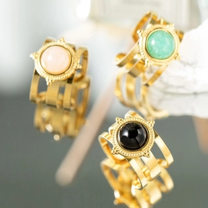 Detailed view of 18K gold plated vintage rings with colorful teardrop zircon and hollow bands