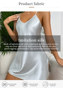 Detail of light blue satin chemise showing silk-like texture and laundry care instructions
