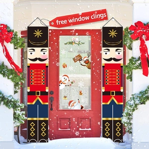 Detail of Christmas nutcracker porch banners with festive holiday window clings