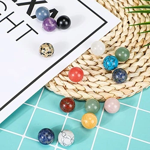 Polished natural crystal sphere set featuring various colorful gemstone balls for decor