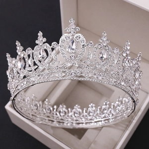 Close-up of silver bridal crown with sparkling rhinestones and crystal teardrops