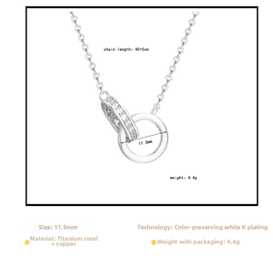 Close-up of interlocking double ring pendant with pave-set cubic zirconia on silver chain