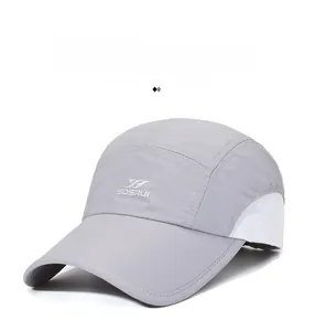 Detail of grey quick-dry baseball cap featuring breathable mesh side panels and logo